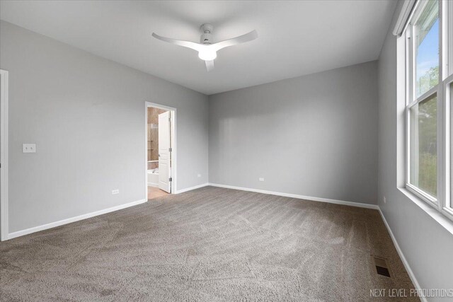 719 Foxborough Rd, South Elgin, IL 60177 - carpeted empty room featuring baseboards and ceiling fan