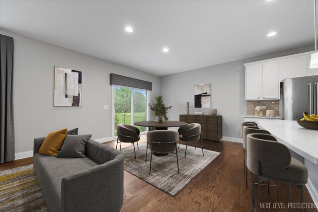 719 Foxborough Rd, South Elgin, IL 60177 - dining room featuring recessed lighting, dark wood-style floors, and baseboards