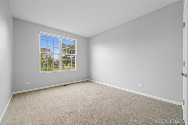 719 Foxborough Rd, South Elgin, IL 60177 - spare room featuring baseboards and carpet floors