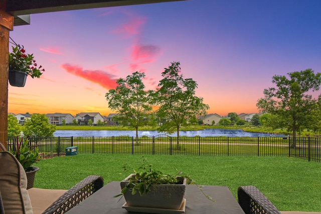 1104 Hershey Rd, Normal, IL 61761 - fenced backyard featuring a water view, a patio area, and a residential view