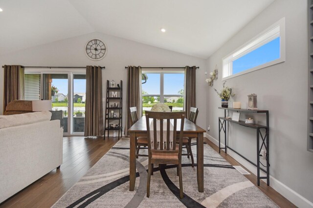 1104 Hershey Rd, Normal, IL 61761 - dining space featuring wood finished floors, vaulted ceiling, and recessed lighting
