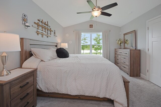 1104 Hershey Rd, Normal, IL 61761 - bedroom with light colored carpet, lofted ceiling, and ceiling fan