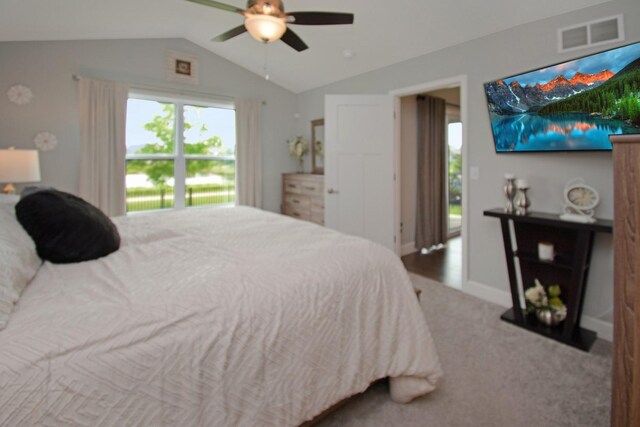 1104 Hershey Rd, Normal, IL 61761 - carpeted bedroom with lofted ceiling and a ceiling fan