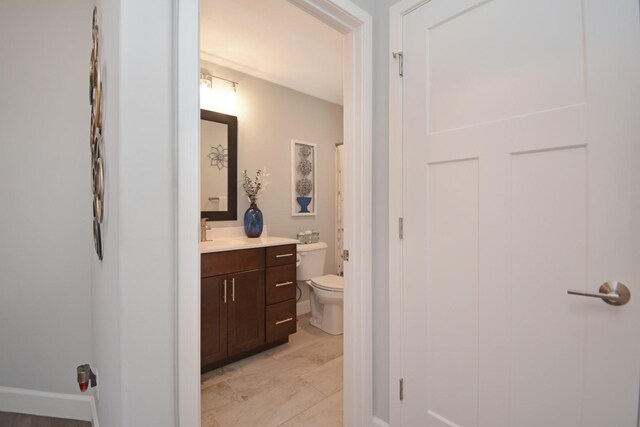 1104 Hershey Rd, Normal, IL 61761 - bathroom featuring vanity and toilet