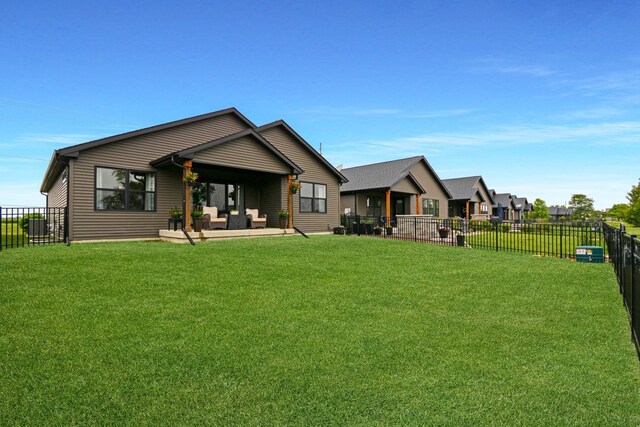 1104 Hershey Rd, Normal, IL 61761 - back of house featuring a fenced backyard, outdoor lounge area, and a patio area
