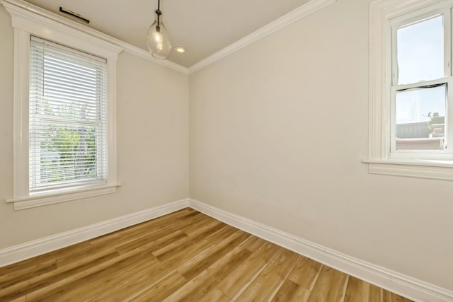 2515 W Augusta Blvd Unit 3S, Chicago, IL 60622 - spare room featuring baseboards, light wood-style floors, and crown molding