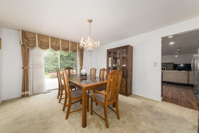 1504 Pfingsten Rd, Glenview, IL 60025 - dining space featuring a chandelier and light colored carpet