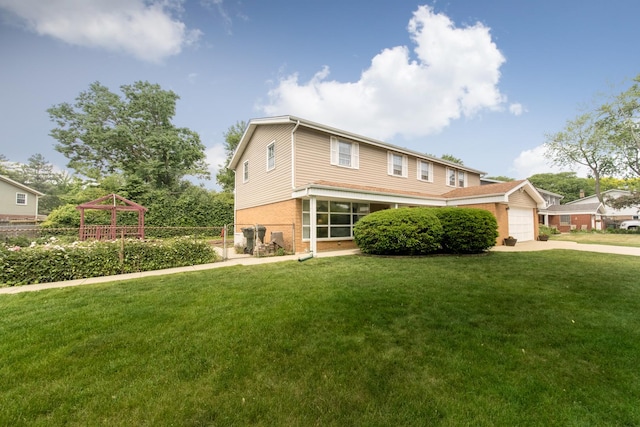 1504 Pfingsten Rd, Glenview, IL 60025 - view of front facade with brick siding, concrete driveway, and a garage