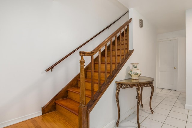 1504 Pfingsten Rd, Glenview, IL 60025 - stairs with baseboards and tile patterned floors