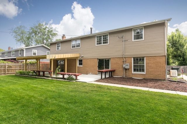 1504 Pfingsten Rd, Glenview, IL 60025 - back of property featuring brick siding, a chimney, and a patio