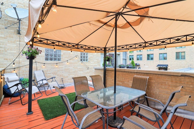 1347 W Washington Blvd Unit 2D, Chicago, IL 60607 - wooden terrace featuring a gazebo and outdoor dining area