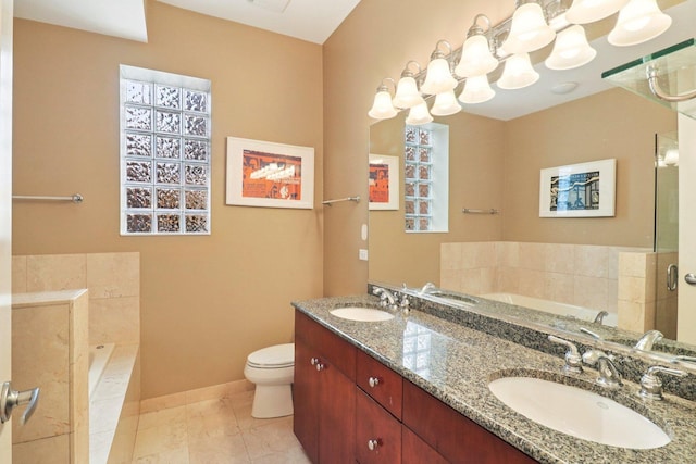 1347 W Washington Blvd Unit 2D, Chicago, IL 60607 - bathroom featuring a bath, double vanity, and tile patterned flooring