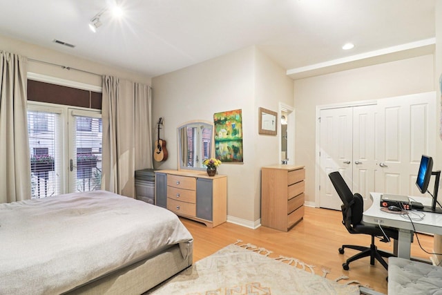 1347 W Washington Blvd Unit 2D, Chicago, IL 60607 - bedroom with access to exterior, light wood-type flooring, a desk, and a closet