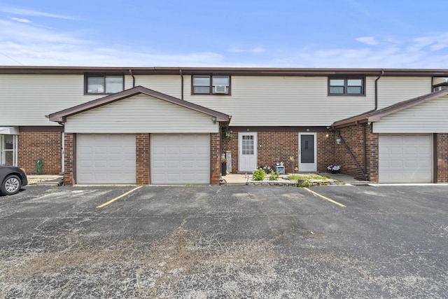 7250 W 84th St Unit C, Bridgeview, IL 60455 - multi unit property with brick siding and a garage