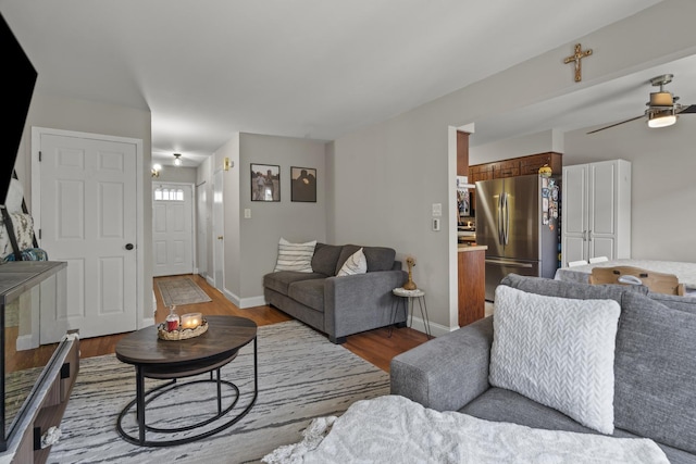 7250 W 84th St Unit C, Bridgeview, IL 60455 - living room with wood finished floors, ceiling fan, and baseboards