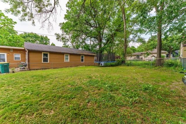 1209 Clark St, Joliet, IL 60432 - view of yard with a trampoline
