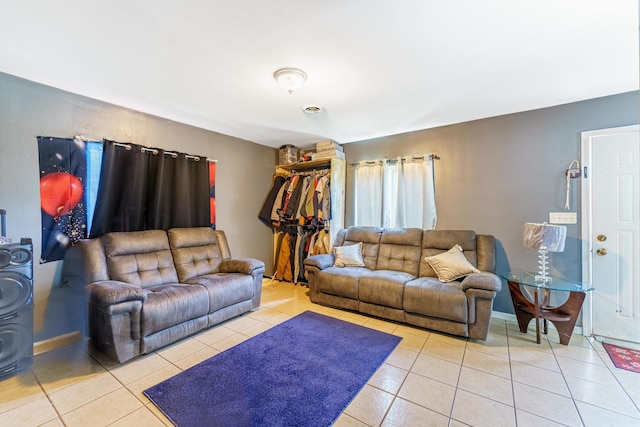 1209 Clark St, Joliet, IL 60432 - living room featuring tile patterned flooring and baseboards