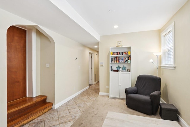8911 Lamon Ave Unit A, Skokie, IL 60077 - living area featuring arched walkways and recessed lighting