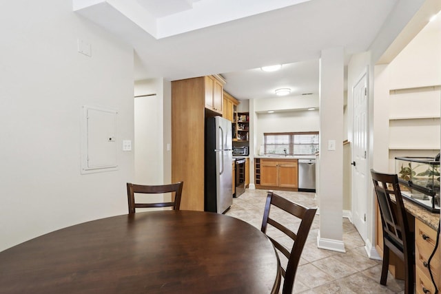 8911 Lamon Ave Unit A, Skokie, IL 60077 - unfurnished dining area featuring electric panel and light tile patterned floors