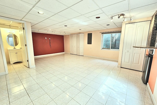 6 Clara Ct, Algonquin, IL 60102 - empty room featuring baseboards, light tile patterned floors, and a paneled ceiling
