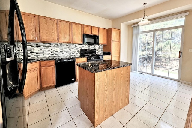 6 Clara Ct, Algonquin, IL 60102 - kitchen with black appliances, decorative backsplash, a kitchen island, dark stone countertops, and light tile patterned floors