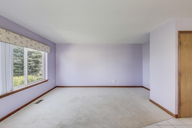 21436 W Larch Ct, Plainfield, IL 60544 - spare room with baseboards and light carpet