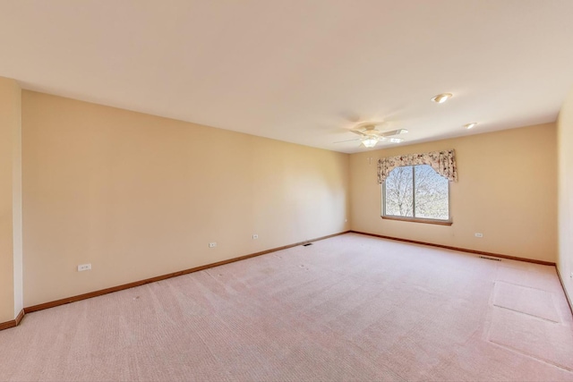 21436 W Larch Ct, Plainfield, IL 60544 - spare room with baseboards, carpet floors, and a ceiling fan