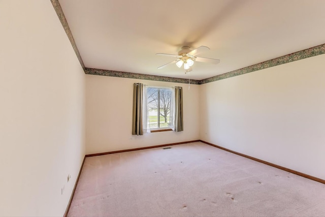 21436 W Larch Ct, Plainfield, IL 60544 - carpeted spare room with ceiling fan and baseboards