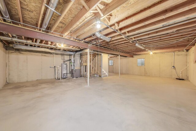 21436 W Larch Ct, Plainfield, IL 60544 - basement featuring gas water heater, stairs, and heating unit