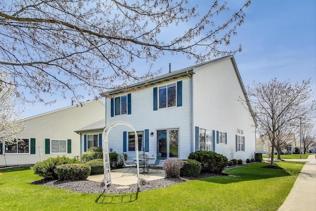 21436 W Larch Ct, Plainfield, IL 60544 - rear view of house with a patio and a yard