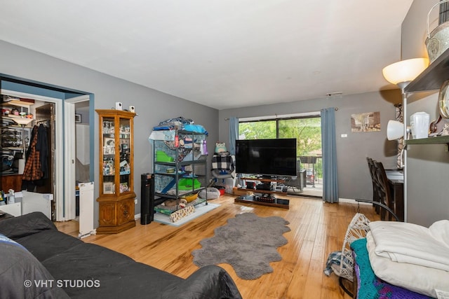 8473 Archer Ave Unit 204, Willow Springs, IL 60480 - living area featuring wood finished floors