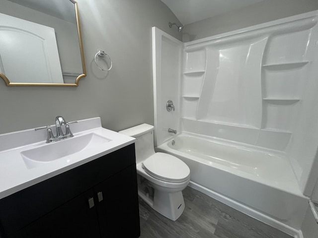 1204 N Park St, Streator, IL 61364 - full bathroom featuring vanity, toilet, wood finished floors, and tub / shower combination