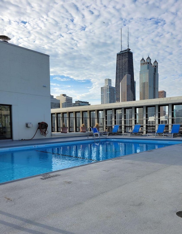 1 E Scott St Unit 1910, Chicago, IL 60610 - community pool featuring a patio area