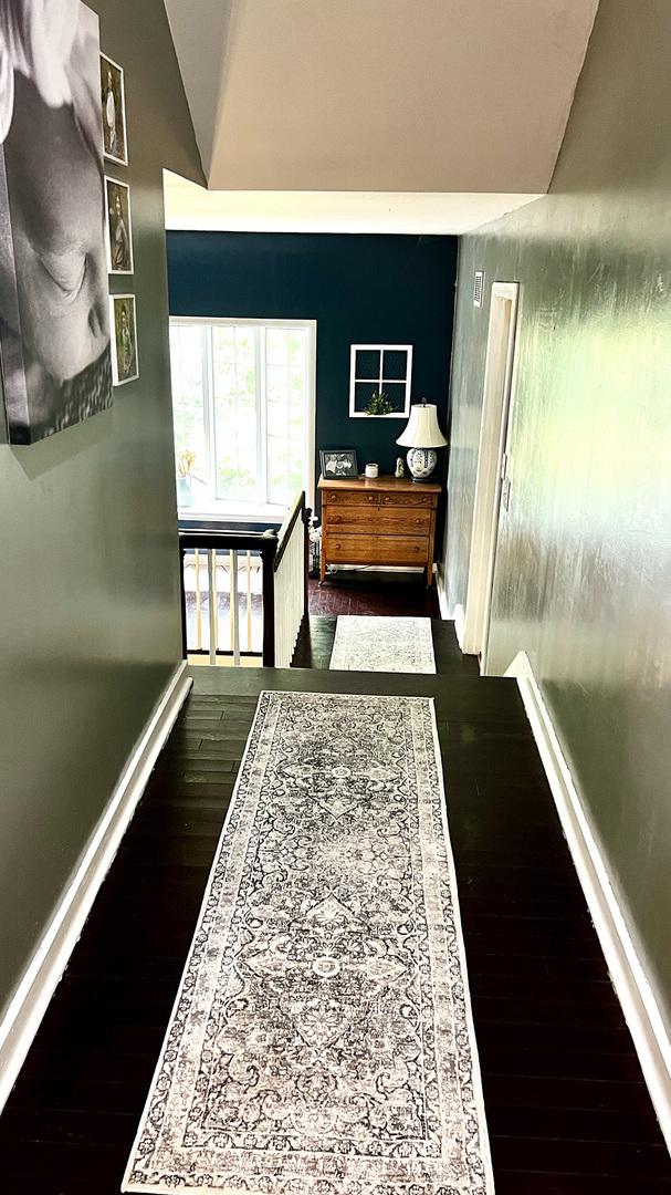 644 Genesee Ave, Morrison, IL 61270 - hall featuring an upstairs landing and hardwood / wood-style flooring