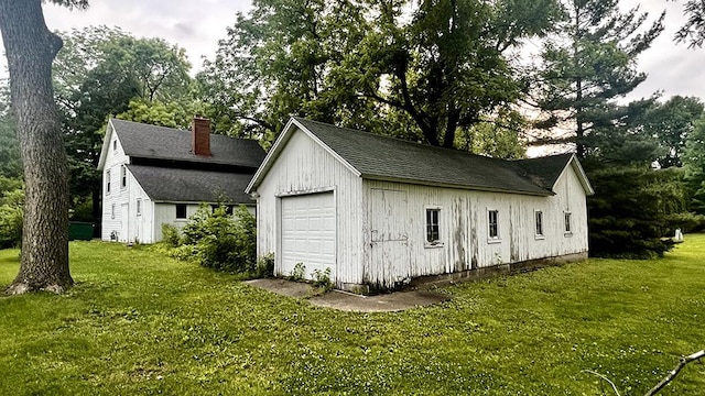 644 Genesee Ave, Morrison, IL 61270 - detached garage featuring view of scattered trees