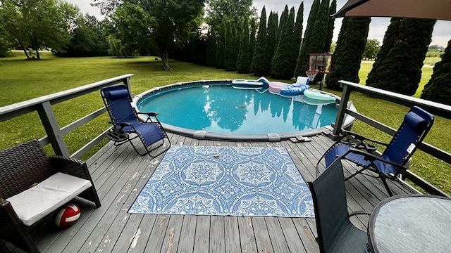644 Genesee Ave, Morrison, IL 61270 - outdoor pool with a wooden deck and a lawn