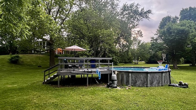 644 Genesee Ave, Morrison, IL 61270 - outdoor pool featuring a yard and view of scattered trees
