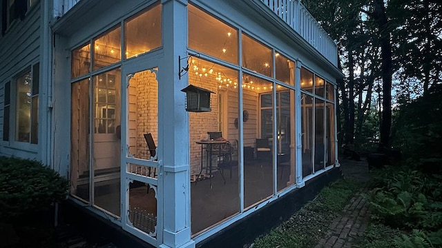 644 Genesee Ave, Morrison, IL 61270 - view of home's exterior with a sunroom