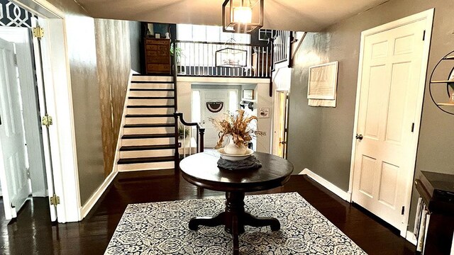 644 Genesee Ave, Morrison, IL 61270 - entrance foyer featuring stairway, wood finished floors, and a chandelier