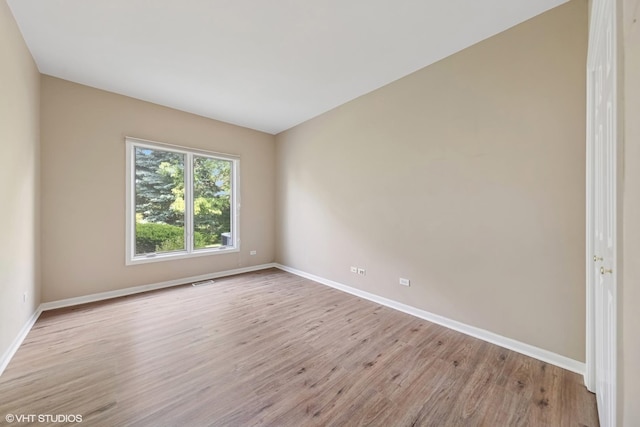 122 Santa Fe Ln, Willow Springs, IL 60480 - unfurnished room featuring wood finished floors and baseboards