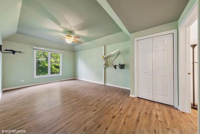122 Santa Fe Ln, Willow Springs, IL 60480 - unfurnished bedroom with wood finished floors, a closet, and a ceiling fan