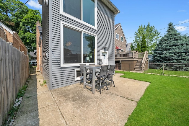 3647 N Nordica Ave, Chicago, IL 60634 - view of patio with a wooden deck, stairs, and outdoor dining area