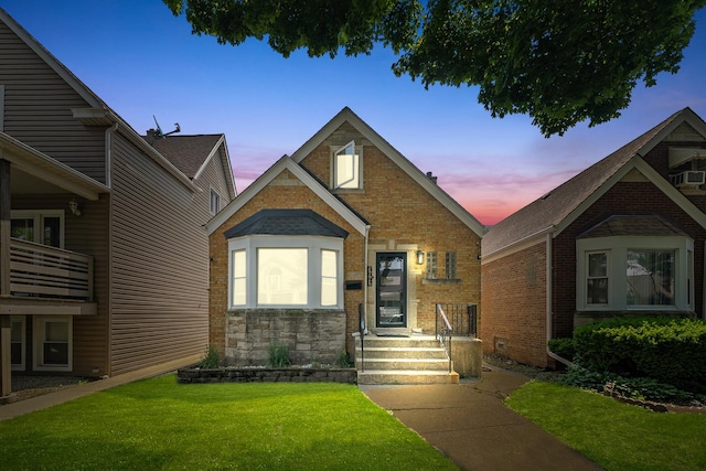 3647 N Nordica Ave, Chicago, IL 60634 - view of front facade with brick siding and a front yard