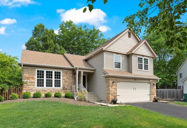 232 Lexington Ct, Grayslake, IL 60030 - view of front of property with stone siding, an attached garage, asphalt driveway, and roof with shingles