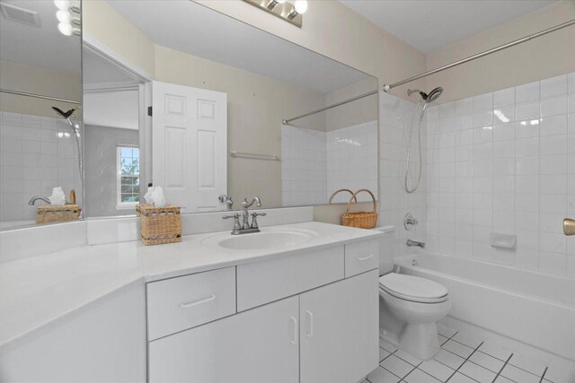 232 Lexington Ct, Grayslake, IL 60030 - bathroom with tile patterned floors, tub / shower combination, and vanity
