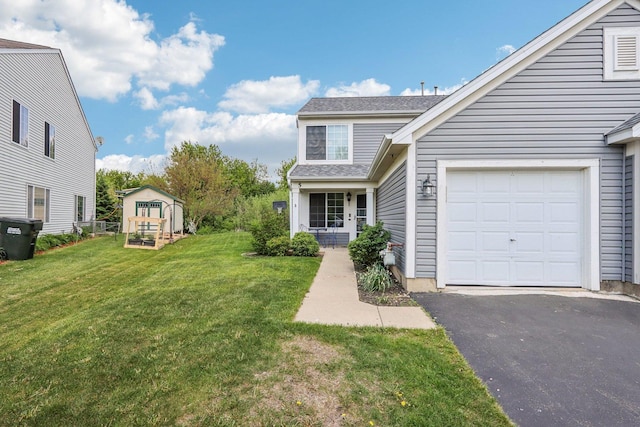 5 Crimson Ct, Lake In The Hills, IL 60156 - view of front of property featuring a front yard, asphalt driveway, and an attached garage