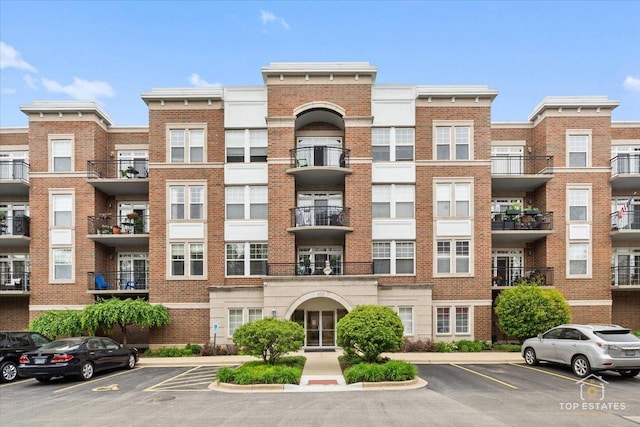 435 W Wood St Unit 410A, Palatine, IL 60067 - view of apartment building / complex featuring uncovered parking