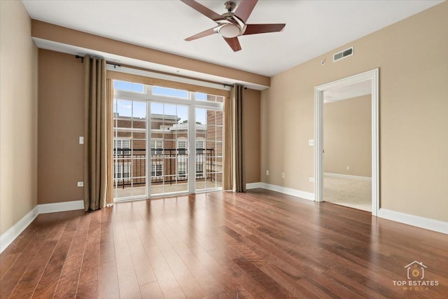 435 W Wood St Unit 410A, Palatine, IL 60067 - spare room featuring a ceiling fan, wood finished floors, and baseboards