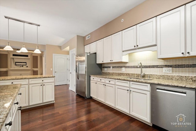 435 W Wood St Unit 410A, Palatine, IL 60067 - kitchen with stainless steel appliances, a sink, dark wood-style flooring, backsplash, and white cabinets