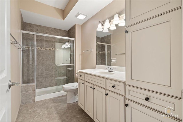 435 W Wood St Unit 410A, Palatine, IL 60067 - bathroom featuring toilet, a stall shower, and vanity